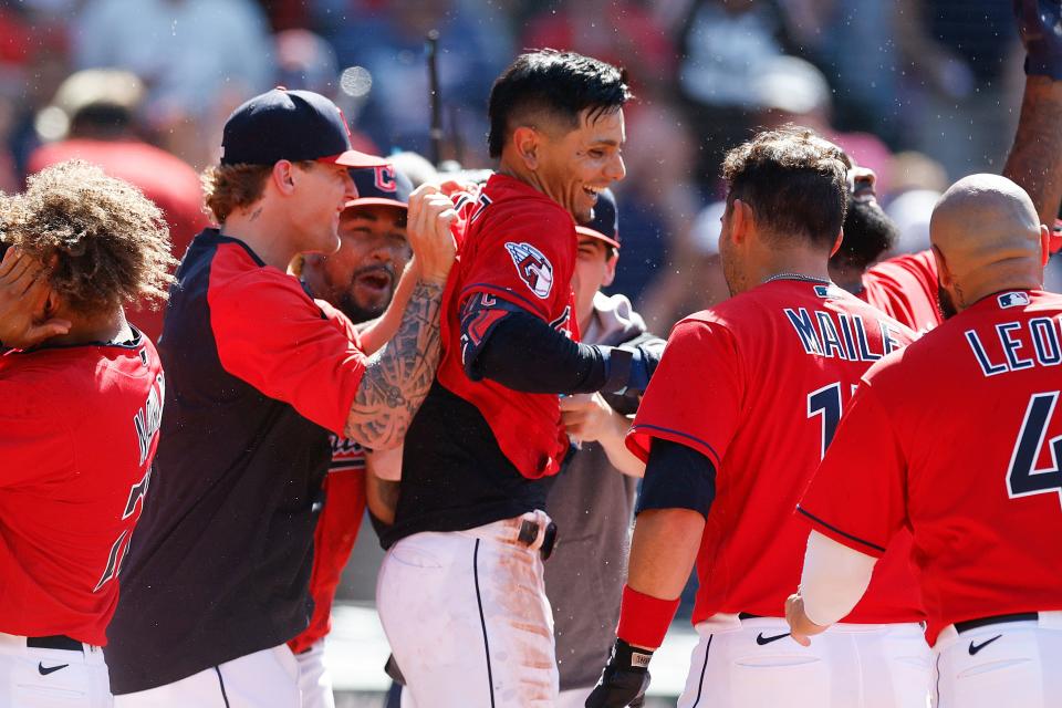 Guardians second baseman Andres Gimenez celebrates with teammates after hitting a game-winning, two-run home run against the Minnesota Twins during the ninth inning Thursday, June 30, 2022, in Cleveland.