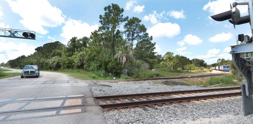 A truck crosses the railroad tracks on Hull Road on Wednesday August 9, 2023, near where a fuel storage and distribution facility is being developed in Ormond Beach.