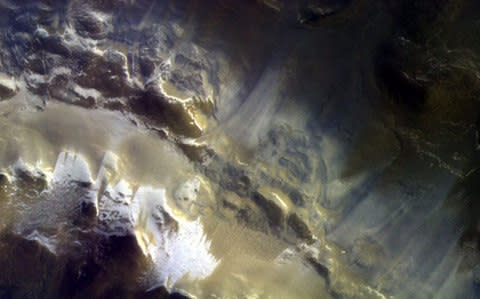 Surface of the Korolev ice-filled crater located in the northern hemisphere of Mars - Credit: PA