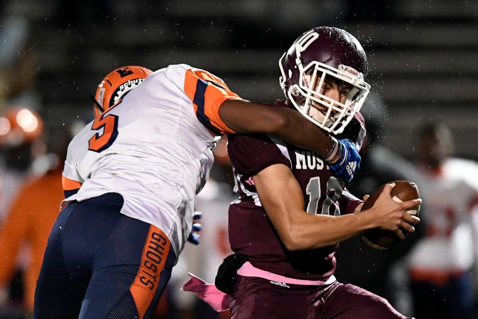 Eastside's Nyreek Clyburn (5) sacks Clifton quarterback Kyle Vellis (10). Clifton defeated Eastside, 17-6, at Clifton Stadium on Friday, Oct. 16, 2020.