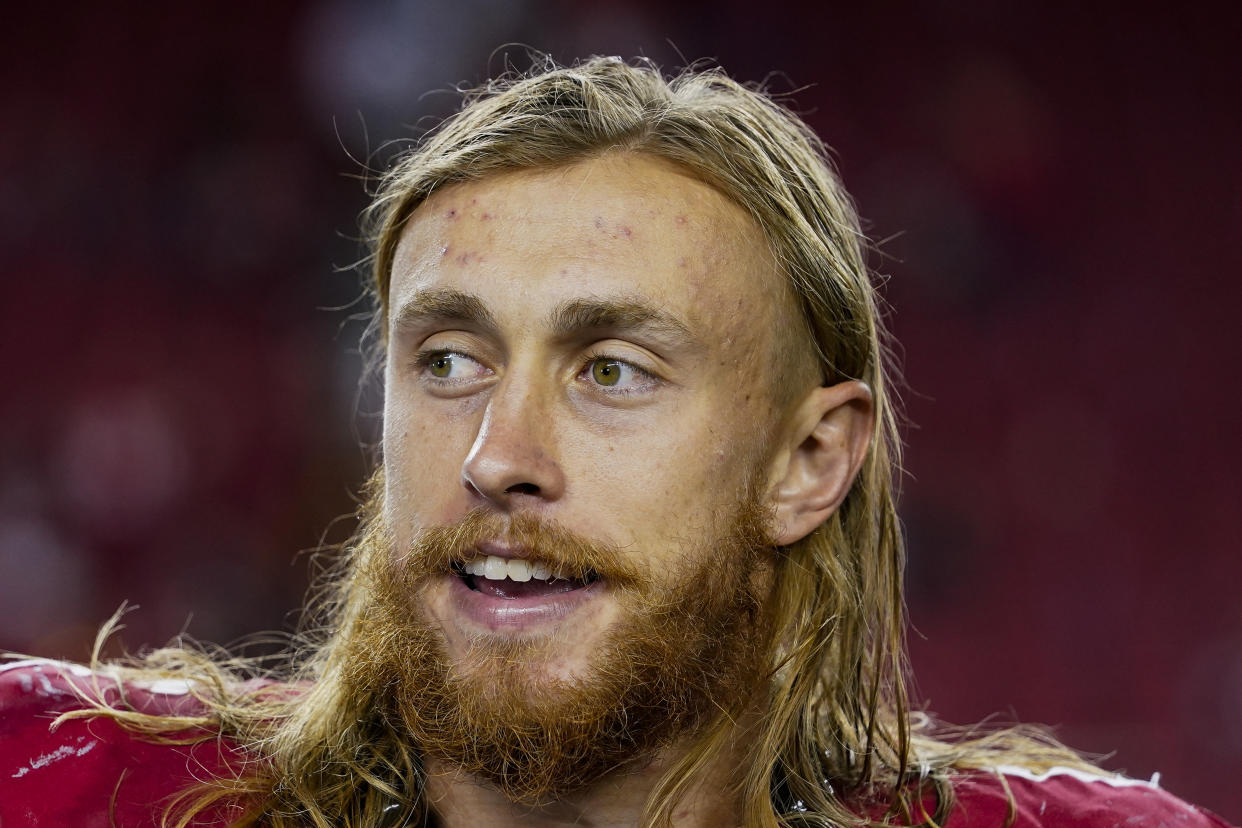 San Francisco 49ers tight end George Kittle talks to a reporter after an NFL football game against the Dallas Cowboys on Sunday, Oct. 8, 2023, in Santa Clara, Calif. (AP Photo/Godofredo A. Vásquez)