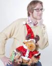 <div class="caption-credit">Photo by: Rock Your Ugly Christmas Sweater</div>Co-author Brian Clark Howard wearing his favorite ugly Christmas sweater, complete with singing and dancing stuffed reindeer, made by co-author Anne-Marie Blackman.