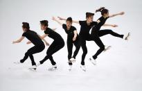 Kim Yuna of South Korea practices her routine during a figure skating training session at the Iceberg Skating Palace during the 2014 Sochi Winter Olympics February 18, 2014. Picture taken with multiple exposure. REUTERS/Lucy Nicholson (RUSSIA - Tags: SPORT FIGURE SKATING OLYMPICS)