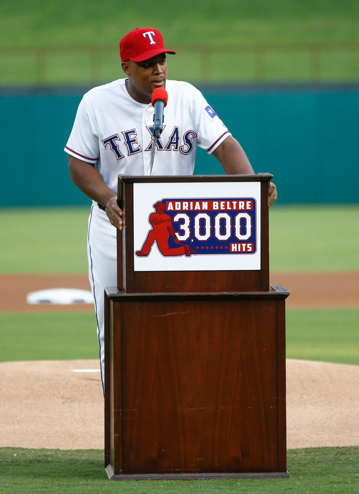 Texas Rangers third baseman Adrian Beltre (29) speaks during pregame ceremony recognizing his 3000th career hit before a baseball game against the New York Yankees at Globe Life Park in Arlington on Friday, Sept. 8, 2017.