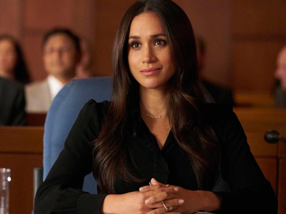 <p>Ian Watson/USA Network/NBCU Photo Bank/NBCUniversal/Getty</p> Meghan Markle as Rachel Zane in 