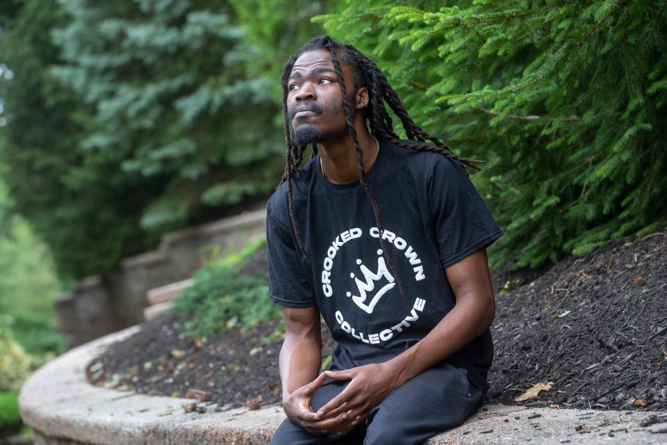 Darryl Harvin, owner of Crooked Crown Apparel, a two-year-old Asbury Park-based provider of modern streetwear, models one of his T-shirts in Eatontown, NJ Thursday, July 7, 2022.