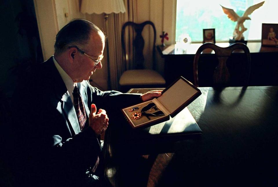 Cruz Reynoso, photographed at his Herald, Calif., home with his Presidential Medal of Freedom in 2000. The giant of civil rights law who was the first Latino justice of the California Supreme Court, died Friday, May 7, 2021, at the age of 90.