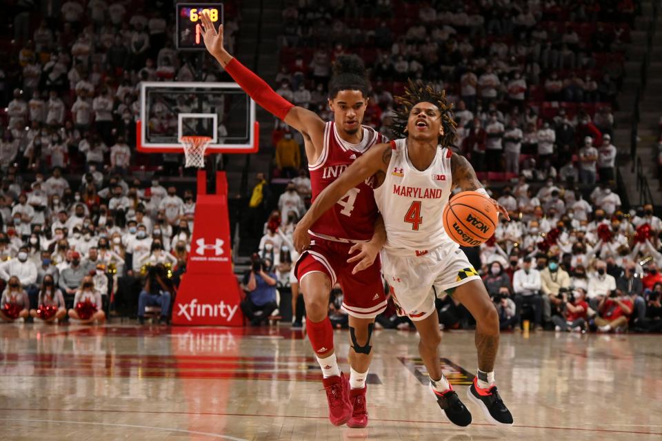 Maryland Terrapins guard Fatts Russell (4) reacts after colliding with Indiana Hoosiers guard Khristian Lander (4) during the second half at Xfinity Center.