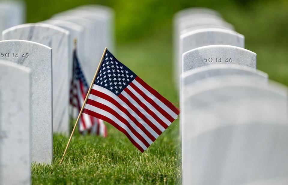 An American flag marks a grave at Leavenworth National Cemetery on Thursday, May 23, 2024, ahead of the Memorial Day holiday. 