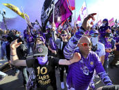 Fans march together into Exploria Stadium ahead of the MLS soccer season opener for Orlando City, in Orlando, Fla., Saturday, Feb. 29, 2020. Orlando City SC take on Real Salt Lake. (Joe Burbank/Orlando Sentinel via AP)