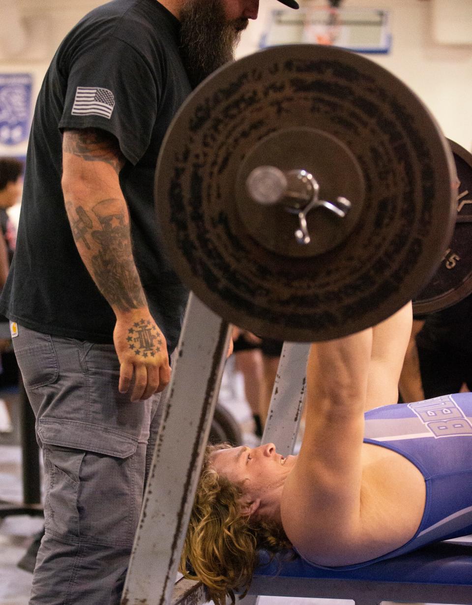 Ethan Dodsworth successfully benches 325 for Belleview High School. The Boys Weightlifting MCIAC Championship was held at Belleview High School in Ocala, FL on Wednesday, March 8, 2023. All seven public high schools took part in the meet. [Doug Engle/Ocala Star Banner]