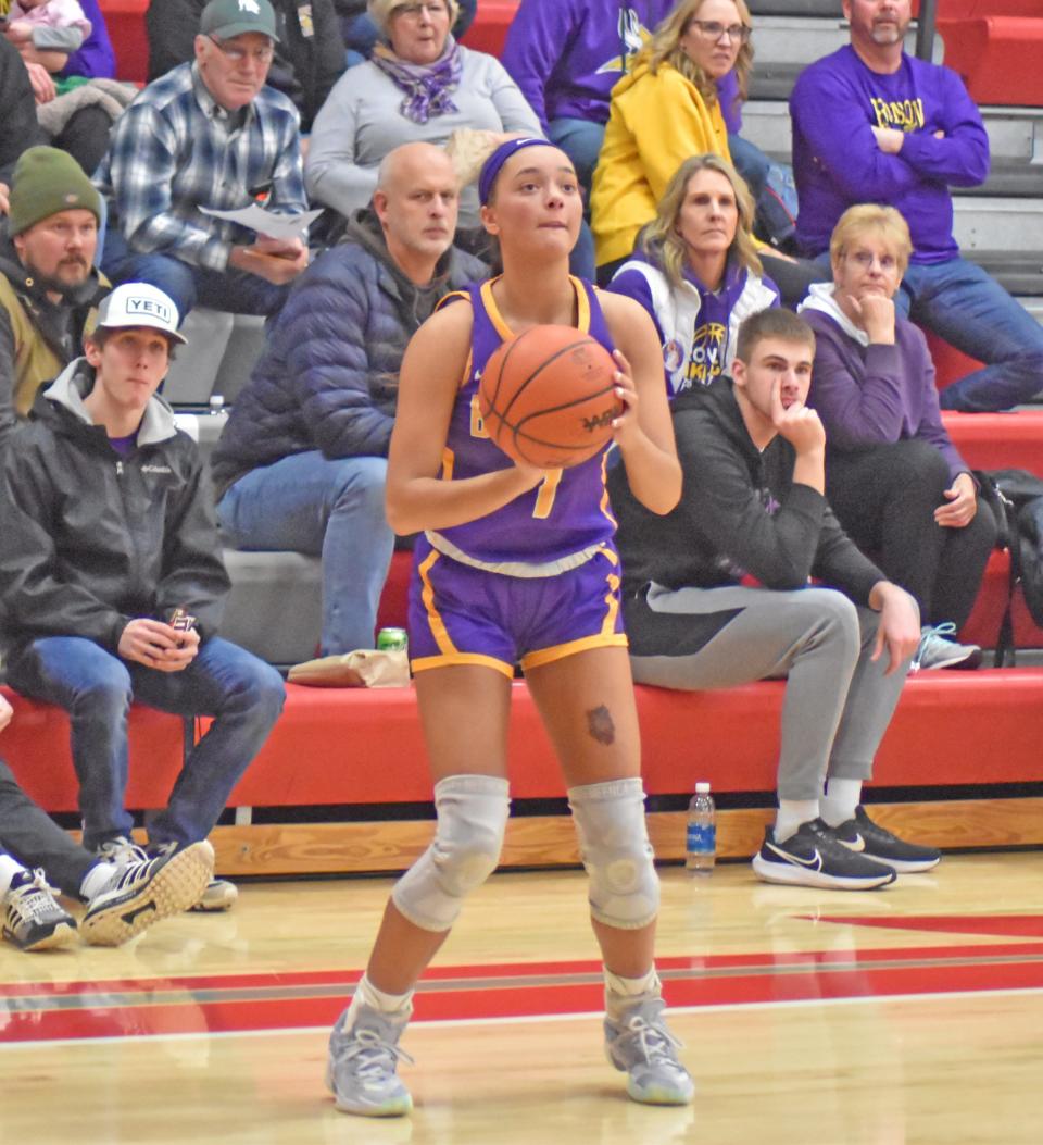 Bronson senior Haylie Wilson spots up for one of her five three pointers Friday in the D3 District Championship game versus White Pigeon.