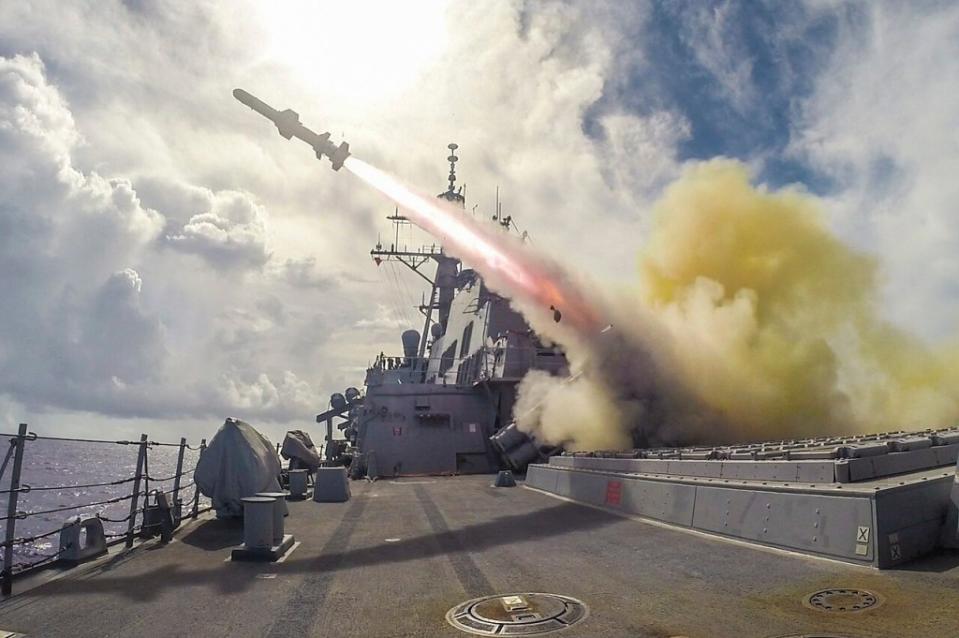 A picture from a live-fire exercise in 2015 showing USS Fitzgerald launching a Harpoon anti-ship missile from one if its two four-round launchers. <em>USN</em>