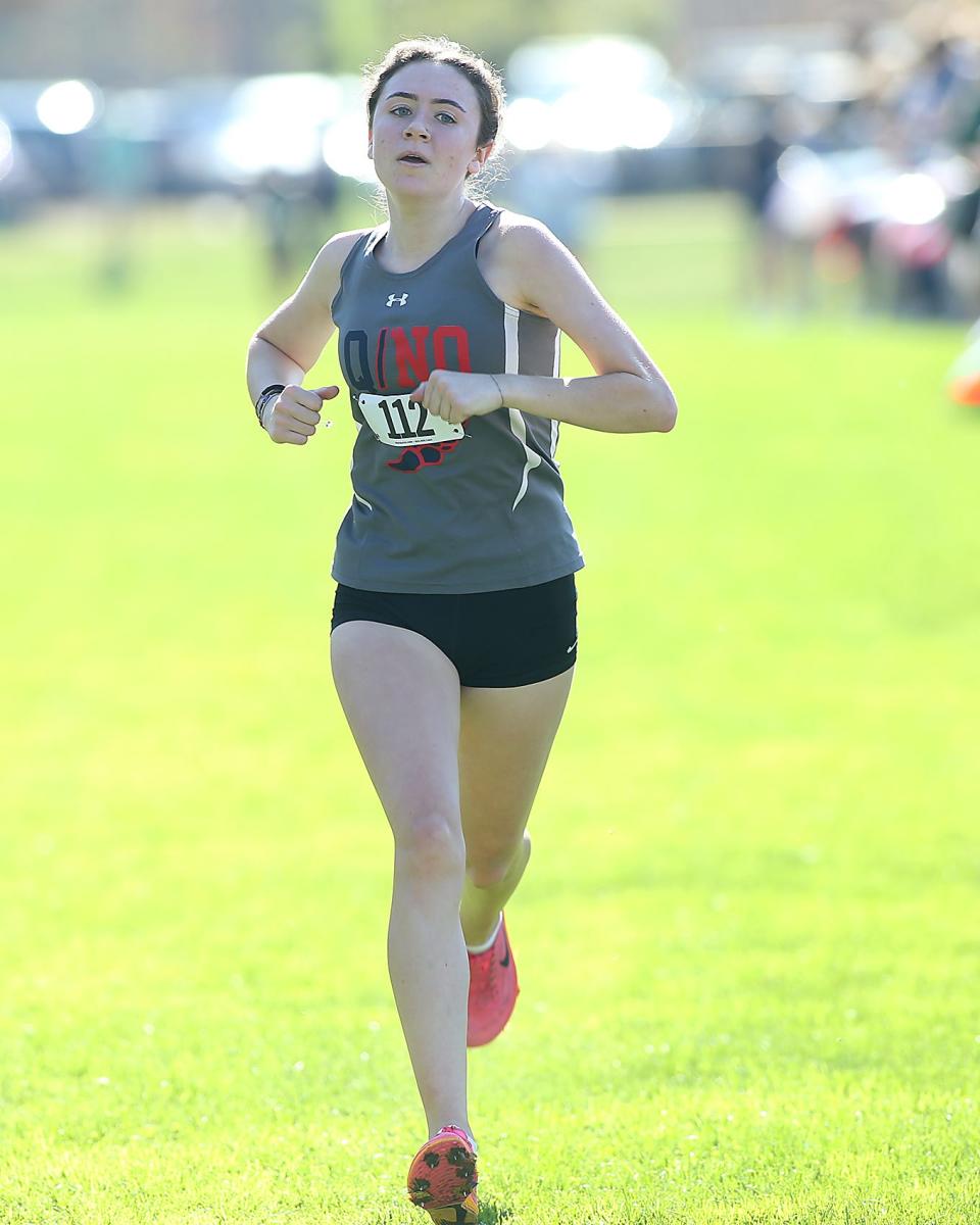 Quincy/ North Quincy’s Aluna Coogan-Coyne takes seventh overall during the Patriot League Championship Meet at Hingham High School on Saturday, Oct. 28, 2023. Plymouth South boys would win with 48 points while Marshfield girls would win with 24 points.