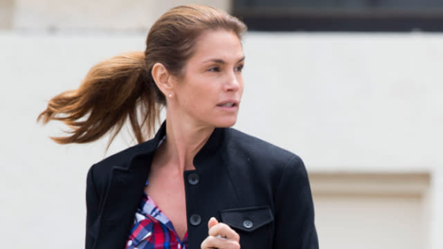 Cindy Crawford does not need makeup to model. The 49-year-old supermodel was spotted stepping out in Malibu, Calif., without makeup and a casual ensemble. And leave it to Crawford to make a flannel shirt, jeans and a black button-up jacket look like high fashion. <strong> WATCH: Cindy Crawford's Untouched Lingerie Pic Is Amazing! </strong> Even her ponytail blows beautifully in the wind! Splash News <strong> PHOTOS: Stars Without Makeup </strong> Then again, it's easy to pull off the natural look with such a flawless face. It's no wonder a Barbie doll was made in the brunette beauty's likeness. Last October, Crawford shared with <em>Elle</em> that she's passing on her great skin tips to her 13-year-old daughter, Kaia. "For my daughter, I want her to feel beautiful with and without makeup, that she can go out of the house with a clean face," Crawford said. "That's why it makes taking care of your skin even more important. Because when your skin looks good, you don't feel like you have to hide behind your makeup." Last February, Crawford and her husband Randy Gerber opened up to ET about their amazing home in Malibu and their marriage. Watch below.: