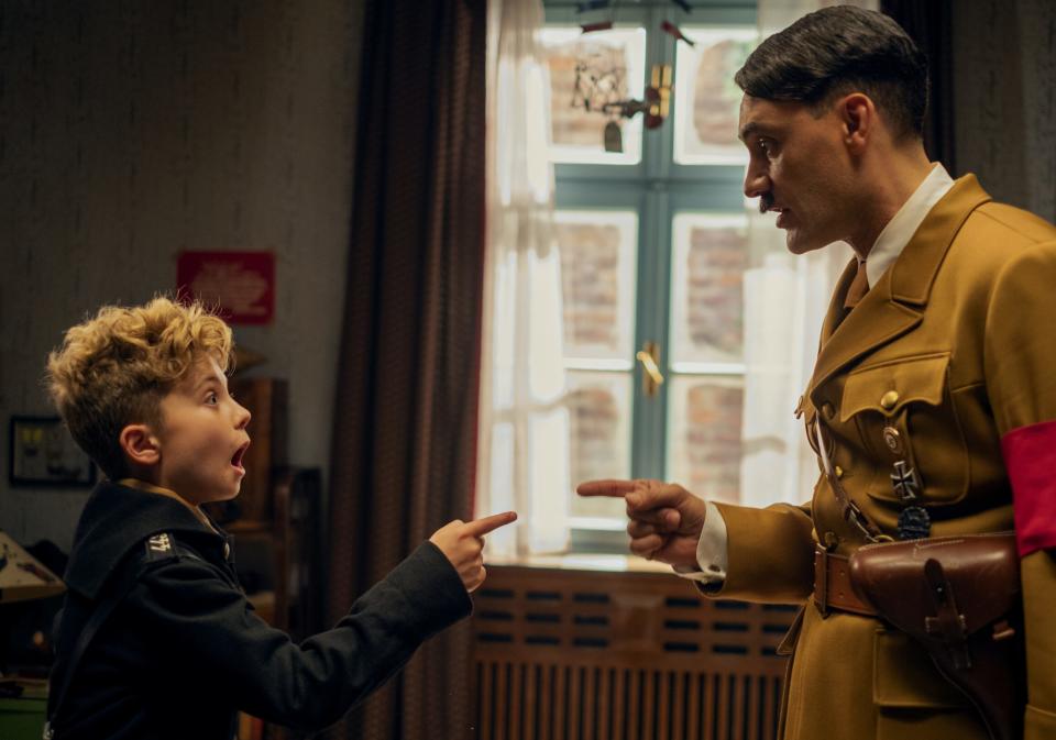 Jojo (Roman Griffin Davis, left) has an imaginary friend, a very goofy Adolf Hitler (Taika Waititi), in 