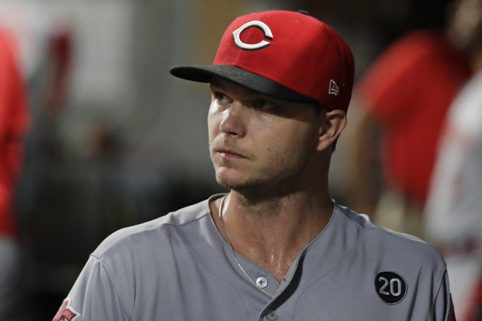 Cincinnati Reds starting pitcher Sonny Gray reacts in the dugout after he was pulled from a baseball game against the Seattle Mariners during the seventh inning Wednesday, Sept. 11, 2019, in Seattle. (AP Photo/Ted S. Warren)
