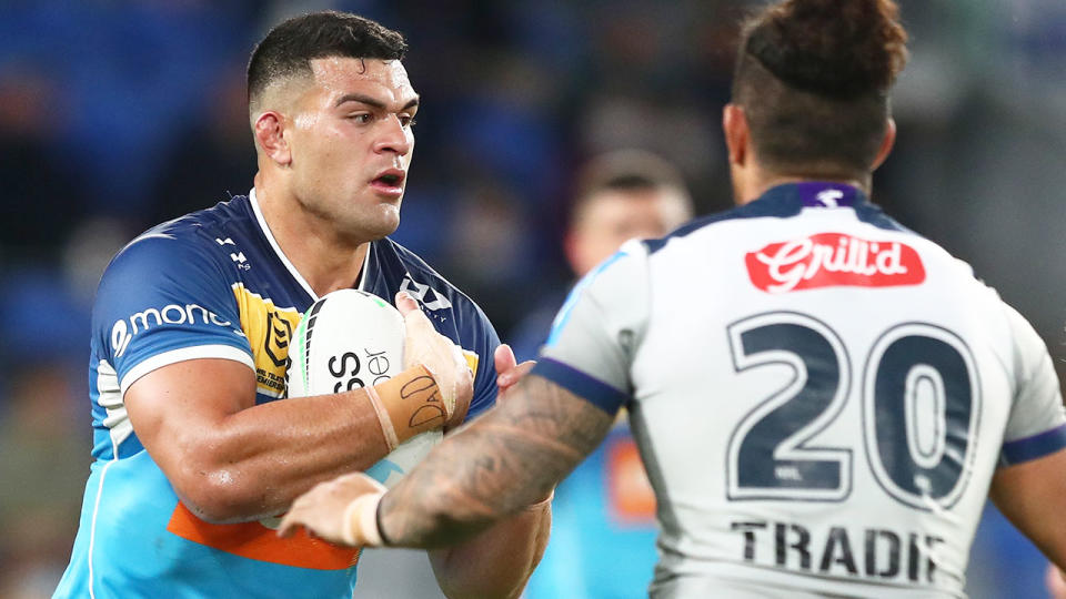 Seen here, David Fifita takes a tackle against the Storm in Round 23.