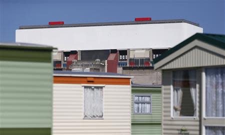 Holiday caravans are seen near Heysham nuclear power station in northwest England April 23, 2013. REUTERS/Suzanne Plunkett