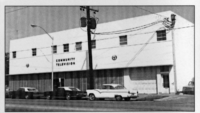 WJCT offices and studios were initially located in this building on Main Street, a former Kaiser/Frazier car dealership.