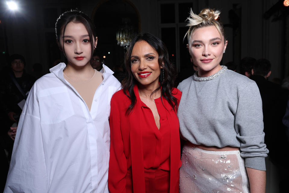 Guan Xiaotong, Simona Caggia, and Florence Pugh at the Valentino fall 2023 show in Paris.