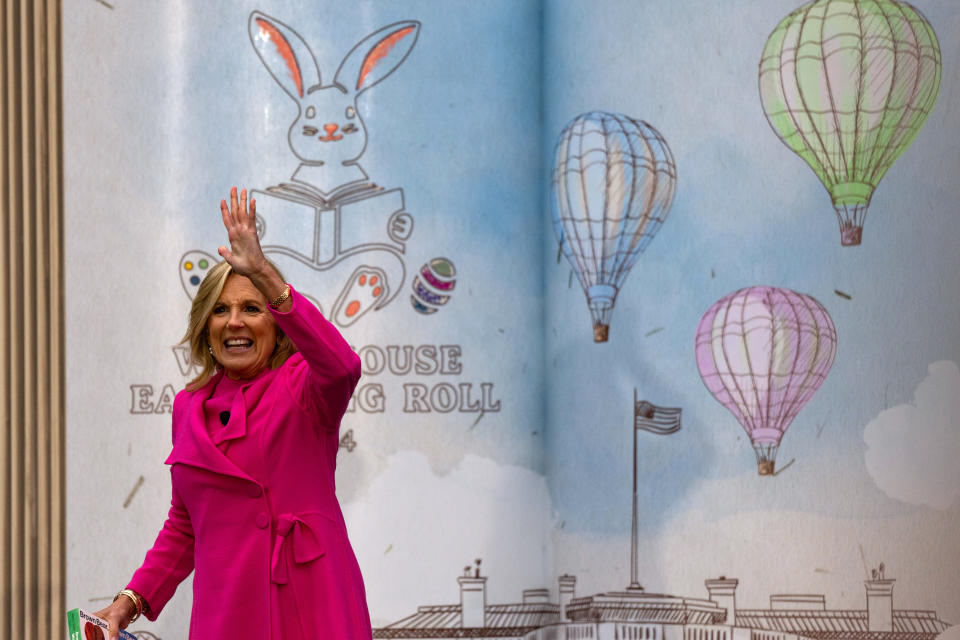 jill biden pink coat dress, WASHINGTON, DC - APRIL 1: First lady Dr. Jill Biden reads the book "Brown Bear, Brown Bear, What Do You See?" By Bill Martin Jr., during the annual White House Easter Egg Roll on the South Lawn of the White House on April 1, 2024 in Washington, DC. The tradition dates back to 1878 when President Rutherford B. Hayes invited children to the White House for Easter and egg rolling on the lawn. (Photo by Kent Nishimura/Getty Images)