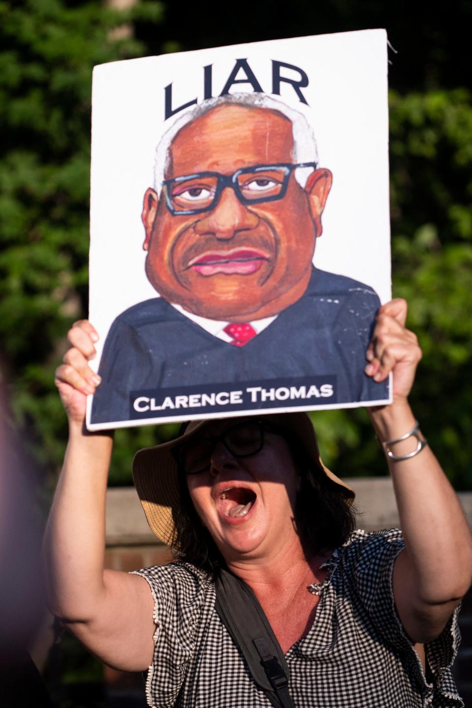 Clarence Thomas liar sign