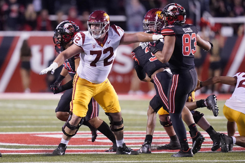 FILE - Southern California offensive lineman Andrew Vorhees (72) defends during the first half of an NCAA college football game against Utah on Saturday, Oct. 15, 2022, in Salt Lake City. Southern California players Vorhees, quarterback Caleb Williams and defensive end Tuli Tuipulotu were selected to The Associated Press All-America team released Monday, Dec. 12, 2022. (AP Photo/Rick Bowmer, File)