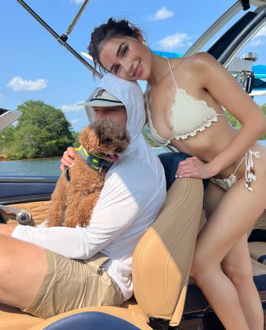 <p>Olivia Culpo/Instagram</p> Christian McCaffrey and Olivia Culpo with their dog, Oliver