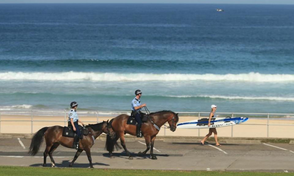 Police patrol Bondi beach to ensure no one is flouting the lockdown rules.