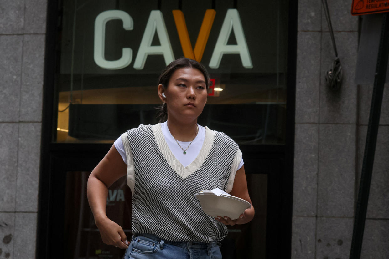 A customer exits a Cava restaurant in New York City, U.S., June 22, 2023.  REUTERS/Brendan McDermid