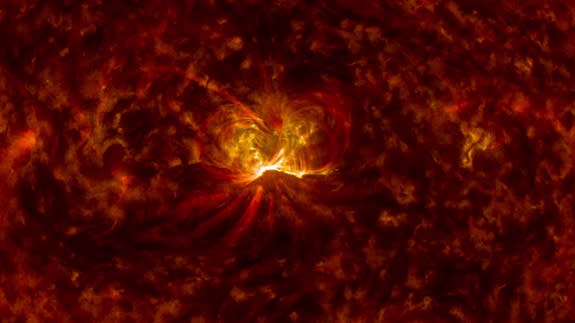 The sun fires off a powerful X1.6-class solar flare on Sept. 10, 2014 in this image captured by NASA's Solar Dynamics Observatory. The flare was associated with an Earth-directed solar eruption, called a coronal mass ejection, that could amplif