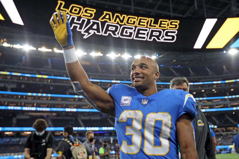 Running back Austin Ekeler #30 of the Los Angeles Chargers celebrates after defeating the Las Vegas Raiders at SoFi Stadium on October 4, 2021 in Inglewood, California.