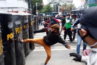 Clashes between demonstrators and officers following a protest against the government's labor reforms in a "jobs creation" bill in Jakarta