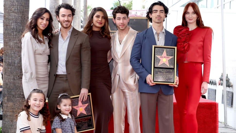 Danielle Jonas, Kevin Jonas, Priyanka Chopra, Nick Jonas, Joe Jonas, Sophie Turner, and (front) Alena Rose Jonas and Valentina Angelina Jonas