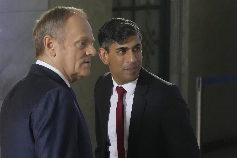 Polish Prime Minister Donald Tusk, left, and Britain's Prime Minister Rishi Sunak pose at the Prime Minister Office in Warsaw, Poland, Tuesday, April 23, 2024. Sunak will hold talks with Tusk and Stoltenberg that will focus on Ukraine and wider European security. (AP Photo/Czarek Sokolowski)