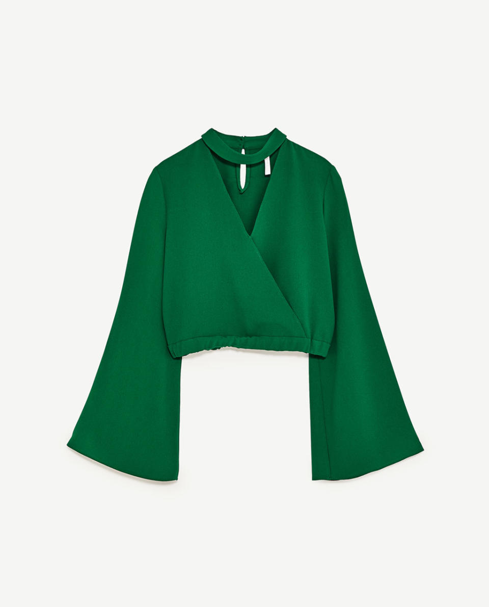 <p><a rel="nofollow noopener" href="https://www.zara.com/uk/en/woman/mid-season-%7C-50-off/belled-sleeve-top-c818525p4373017.html" target="_blank" data-ylk="slk:Zara, £9.99;elm:context_link;itc:0;sec:content-canvas" class="link "><i>Zara, £9.99</i></a> </p>