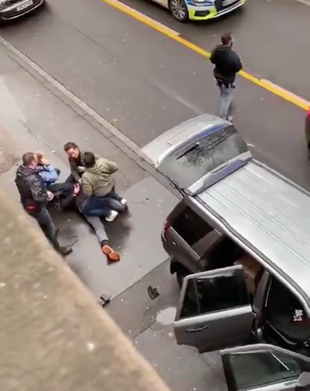 People gather to help a pedestrian following the crash in Trier. Source: Twitter/@Sotiridi1