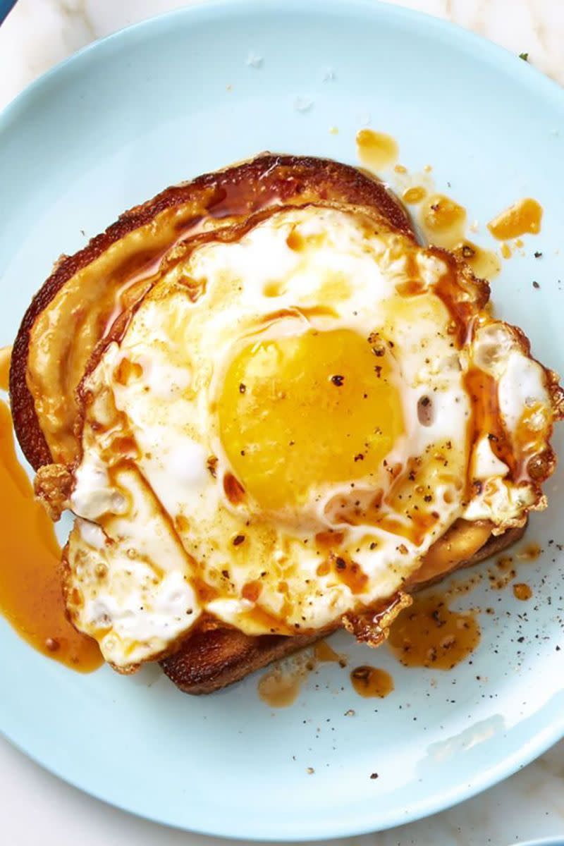 breakfast in bed smoky red pepper crispy egg toast on a plate