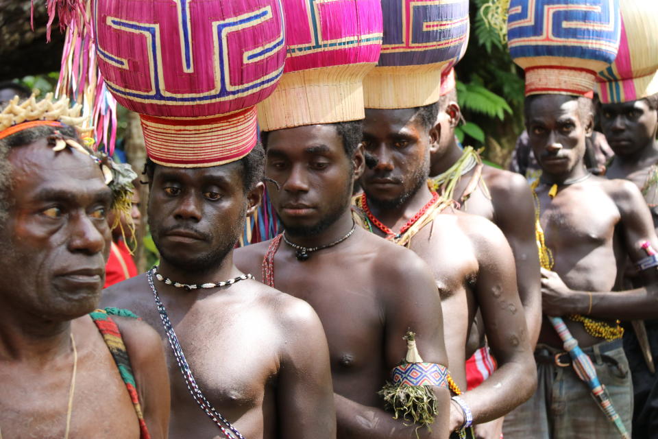 FILE - In this Nov. 29, 2019, file photo, the Upe members wait to vote in the Bougainville referendum in Teau, Bougainville, Papua New Guinea. The South Pacific region of Bougainville has voted for independence from Papua New Guinea. The referendum is nonbinding, and independence would need to be negotiated between leaders from Bougainville and Papua New Guinea. (Jeremy Miller, Bougainville Referendum Commission via AP, File)