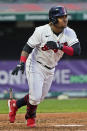 Cleveland Indians' Jose Ramirez watches his two-run double during the sixth inning of the team's baseball game against the Cincinnati Reds, Saturday, May 8, 2021, in Cleveland. (AP Photo/Tony Dejak)