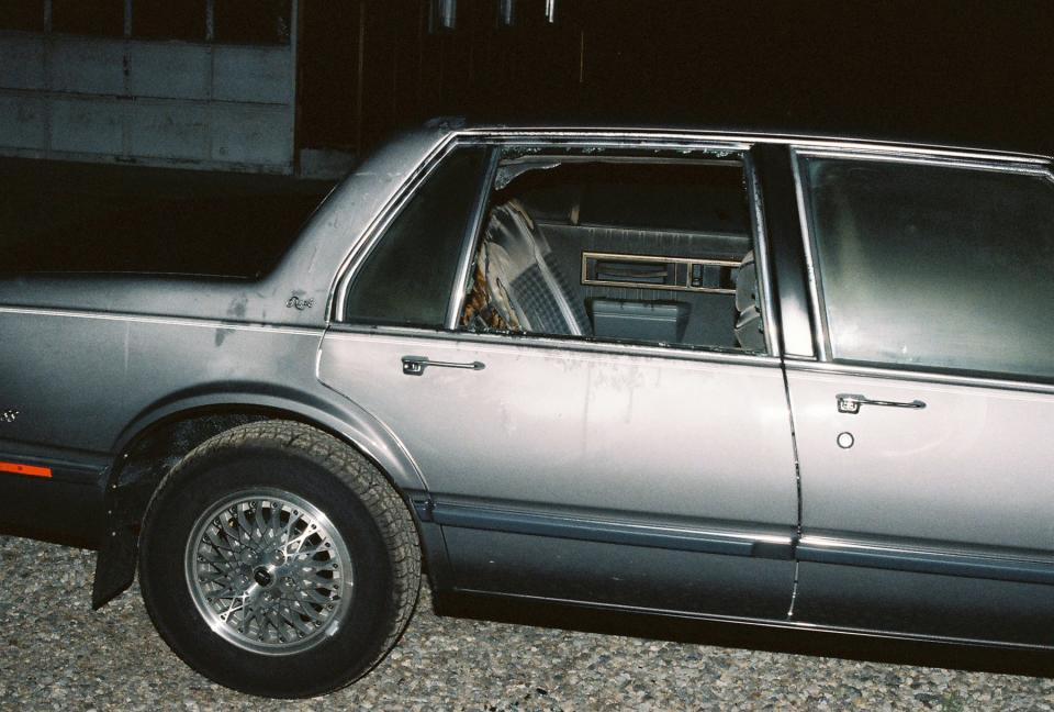 This State Police photo shows Karen Mason's burned 1988 Oldsmobile Delta '88 Royale parked outside her father's summer home in Hope at the time of her death in May 1988.