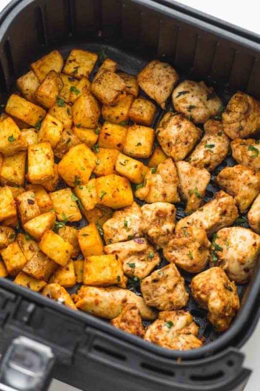 <p>Little Sunny Kitchen</p><p>This Air Fryer chicken and potatoes is the easiest and tastiest weeknight dinner! Ready in under half an hour, this chicken dinner requires just a few simple ingredients but results in amazing flavors!</p><p><strong>Get the recipe: <a href="https://littlesunnykitchen.com/air-fryer-chicken-and-potatoes/" rel="nofollow noopener" target="_blank" data-ylk="slk:Air Fryer Chicken and Potatoes;elm:context_link;itc:0;sec:content-canvas" class="link ">Air Fryer Chicken and Potatoes</a></strong></p>