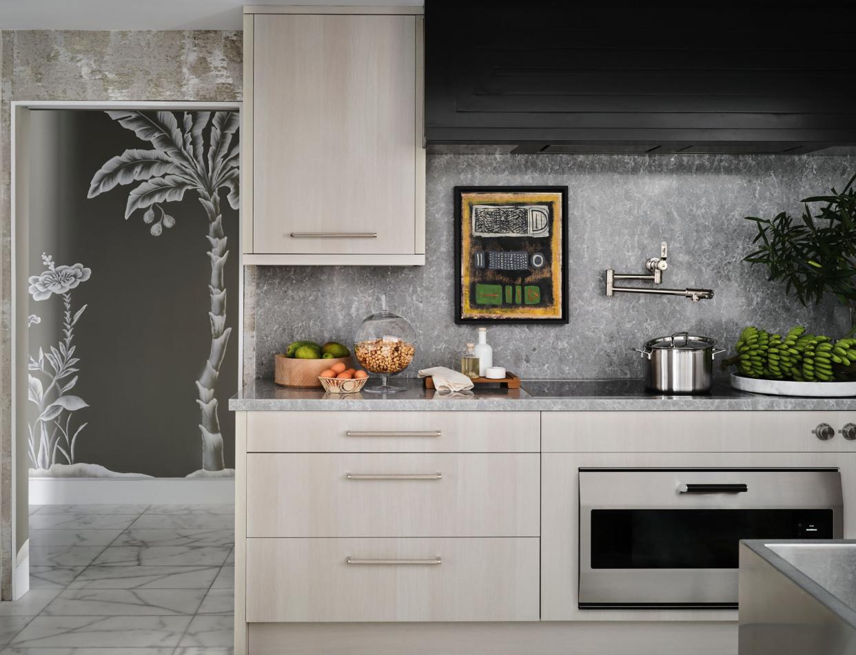 The kitchen has Downsview Kitchen cabinets built from rift-sawn bleached white oak.