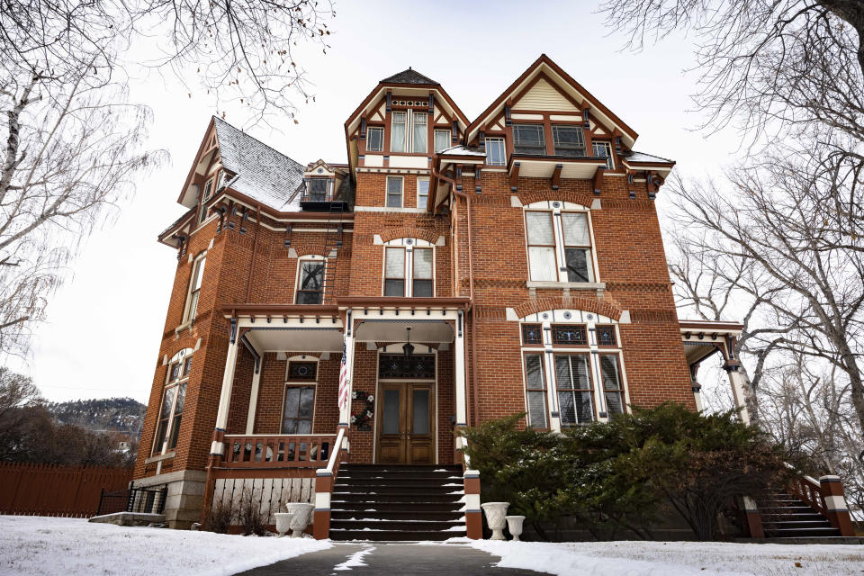 Montana Gov. Greg Gianforte and first lady Susan Gianforte announced their private purchase of the historic Samuel T. Hauser House in Helena, Mont., historic mansion district on Monday, Jan. 8, 2024. The home will serve as their primary residence in Helena and they plan to donate it to the State of Montana. (Thom Bridge/Independent Record via AP)