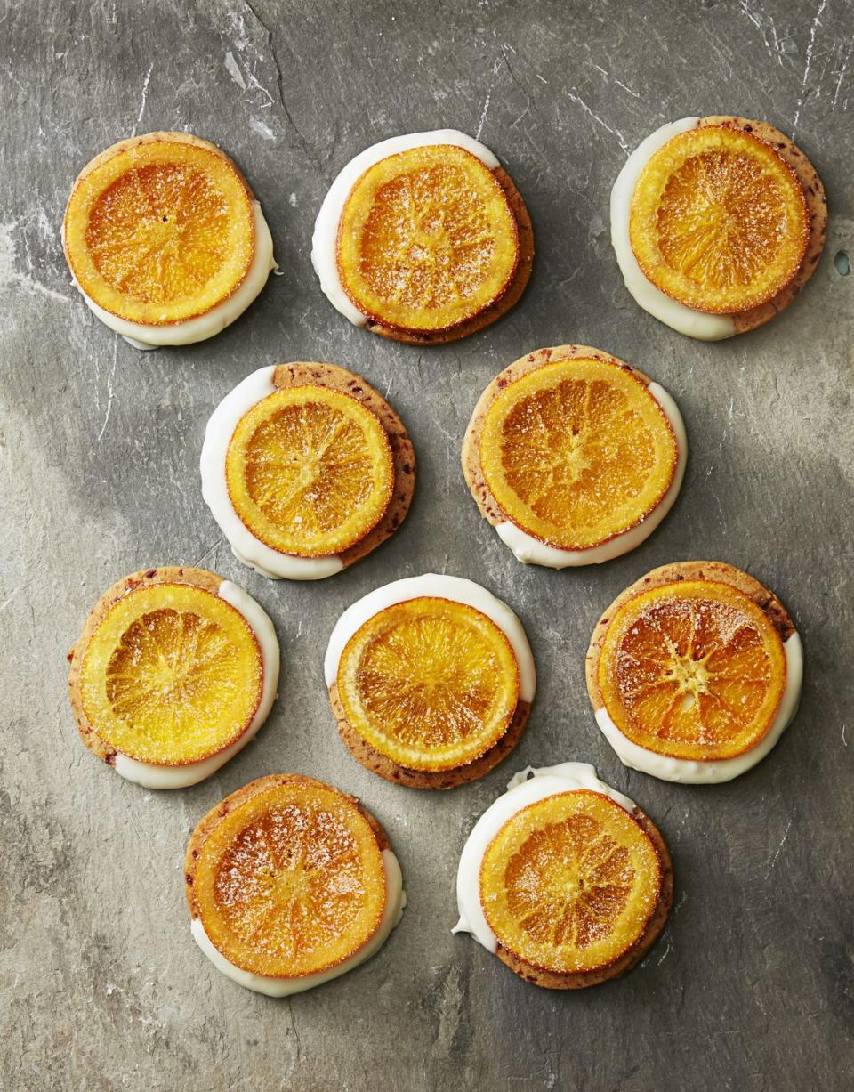 <p>If you like chocolate-covered orange rinds, you'll love this white chocolate-dipped cookie version. Talk about impressive.</p><p>Get the<strong> <a href="https://www.goodhousekeeping.com/food-recipes/dessert/a35763/chocolate-citrus-cran-wheels/" rel="nofollow noopener" target="_blank" data-ylk="slk:Chocolate-Citrus Cran Wheels recipe;elm:context_link;itc:0;sec:content-canvas" class="link ">Chocolate-Citrus Cran Wheels recipe</a></strong>.</p>