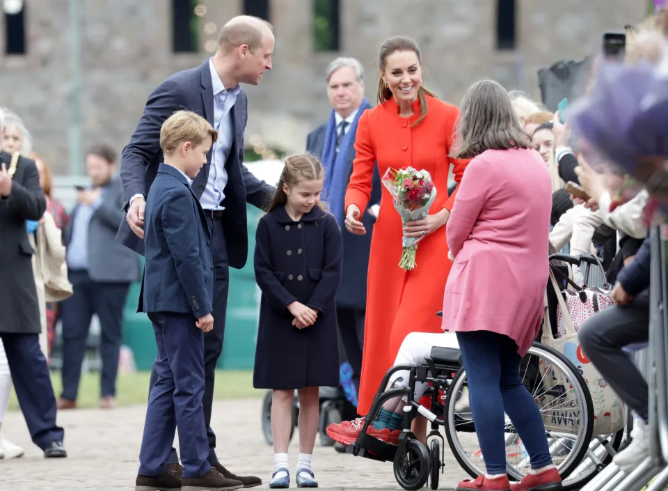 Wearing red means the Duchess of Cambridge can be easily spotted in a crowd. (Getty Images)