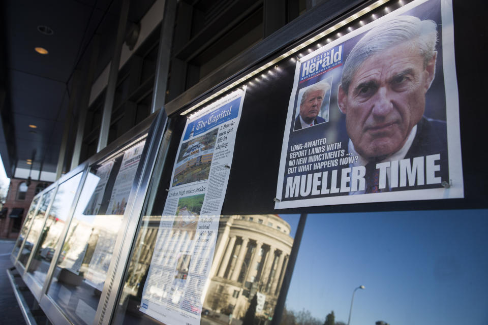 Newspaper front pages from around the nation are on display at the Newseum Saturday, March 23, 2019, in Washington. Special counsel Robert Mueller closed his long and contentious Russia investigation with no new charges, ending the probe that has cast a dark shadow over Donald Trump's presidency. (AP Photo/Alex Brandon)