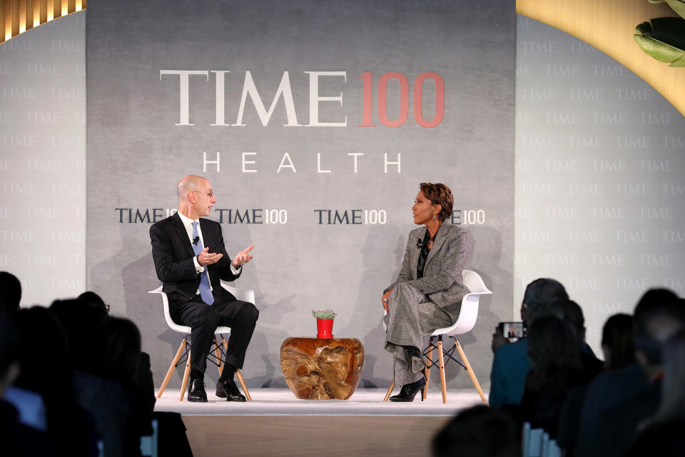 Commissioner of the NBA, Adam Silver (L), speaks with news broadcaster, Robin Roberts, onstage during the TIME 100 Health Summit at Pier 17 in New York City on Oct. 17, 2019. | Cindy Ord—Getty Images for TIME 100 Health