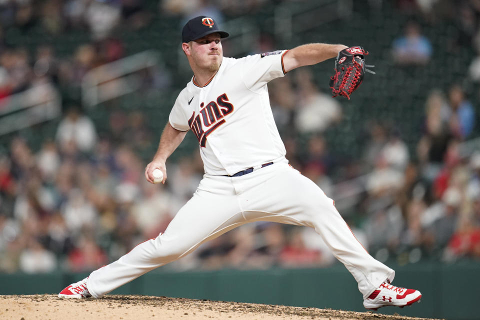 Minnesota Twins starting pitcher Dylan Bundy delivers during the fifth inning of a baseball game against the Boston Red Sox, Monday, Aug. 29, 2022, in Minneapolis. (AP Photo/Abbie Parr)